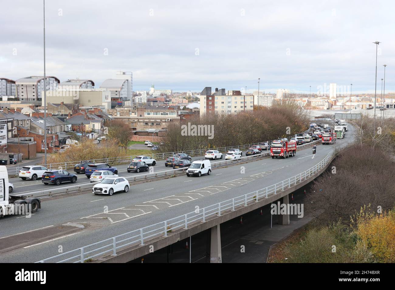 Gateshead UK: 20th Nov 2021: Newcastle Gateshead truckers protesting fuel prices in a go-slow drive through city centre with Police escort. View from highrise tower block Stock Photo