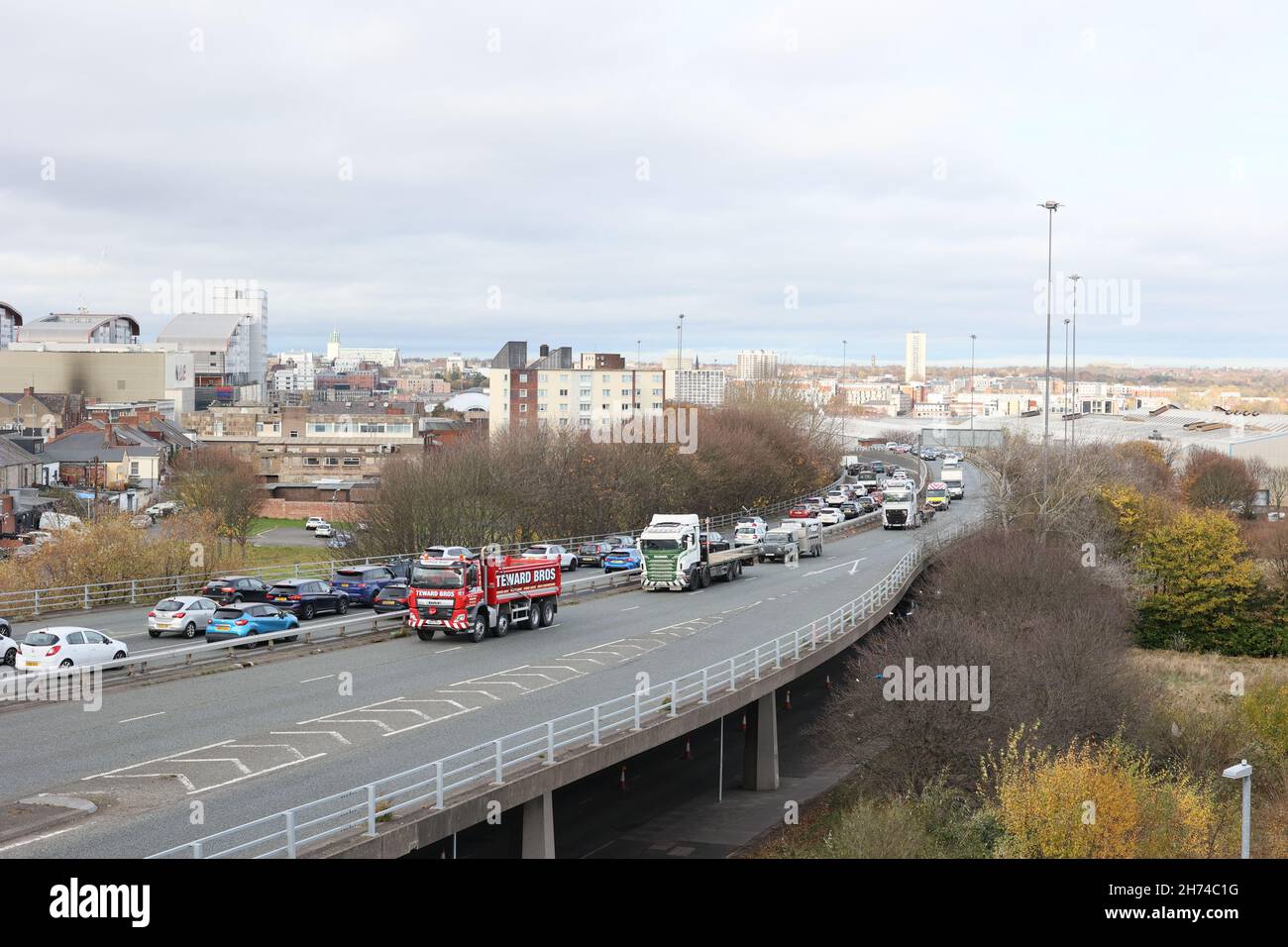 Gateshead UK: 20th Nov 2021: Newcastle Gateshead truckers protesting fuel prices in a go-slow drive through city centre with Police escort. View from highrise tower block Stock Photo