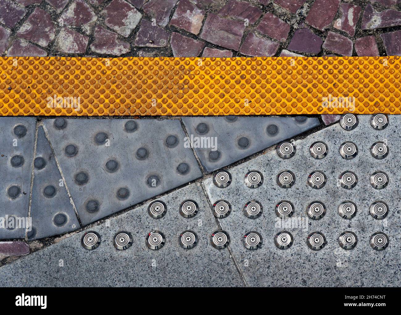 Warning bumps for blind people on sidewalk Stock Photo Alamy