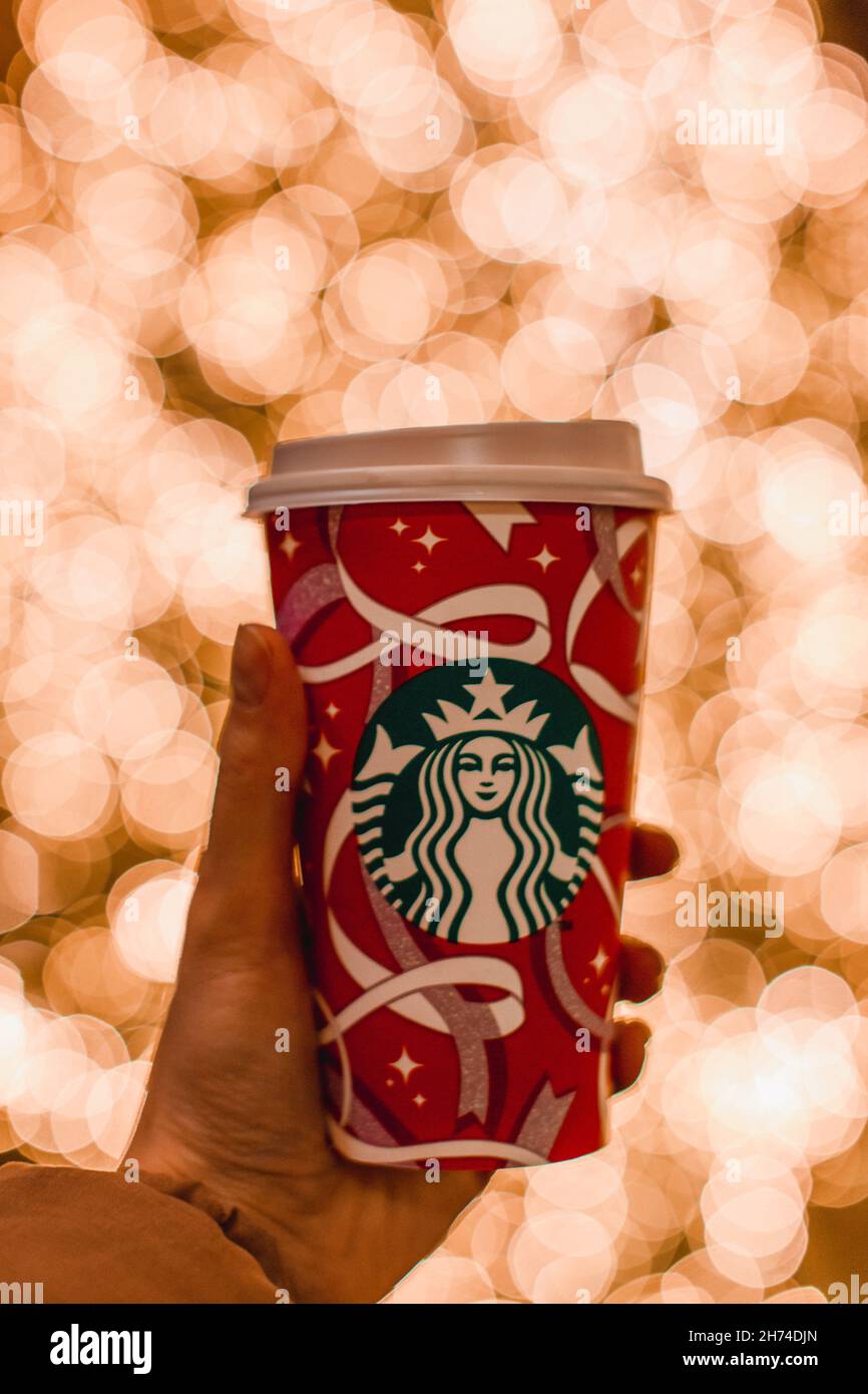 Holding starbucks cup hi-res stock photography and images - Alamy