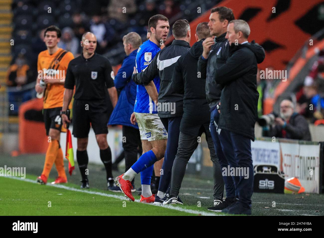 Gary Gardner #20 of Birmingham City is escorted off the pitch after receiving a red card in the first half Stock Photo