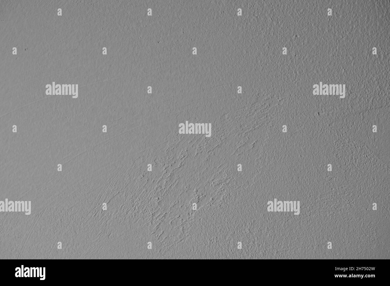 Plaster wall closeup. Decorative plaster. BW photo Stock