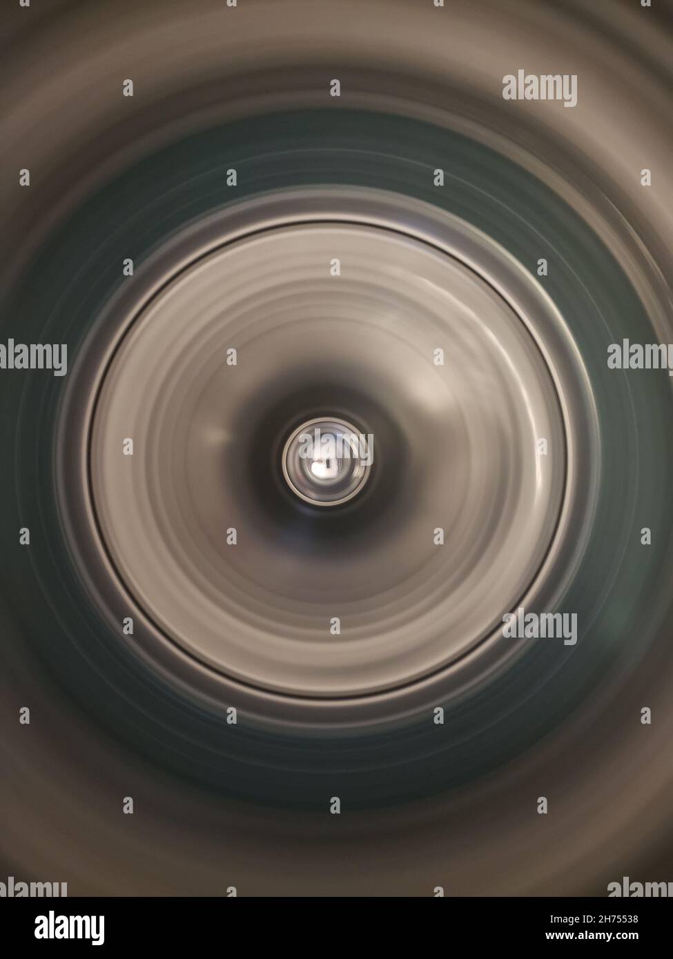 Looking into the Tub of a Washing Machine on Spin Cycle Stock Photo