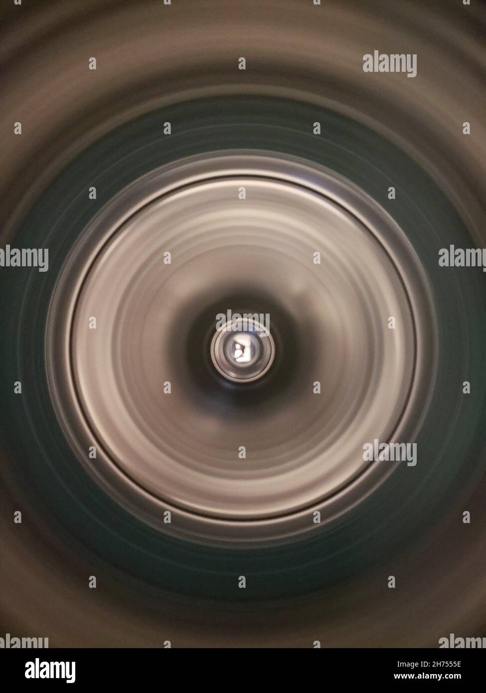 Looking into the Tub of a Washing Machine on Spin Cycle Stock Photo