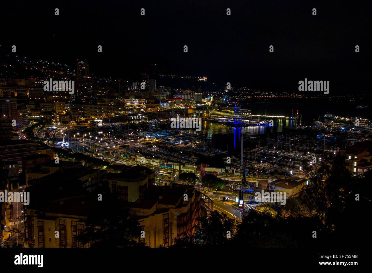 Monte Carlo in Monaco, France at night, overlooking the port Stock Photo