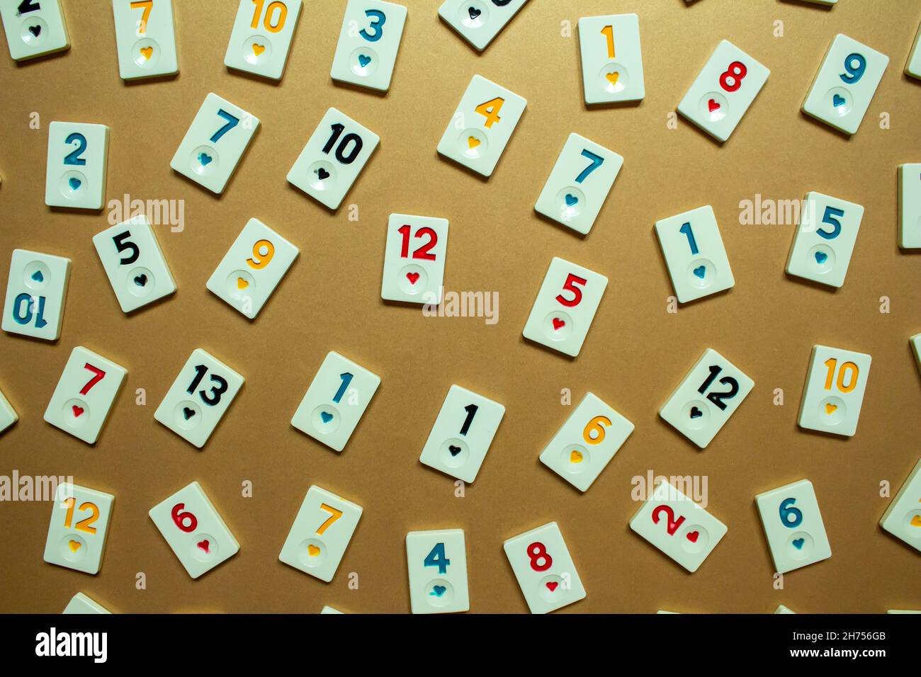Rummikub game tiles, top view of rummikub tiles isolated on colorful