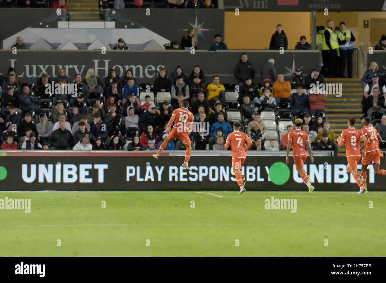 Swansea, UK. 20th Nov, 2021. Keshi Anderson of Blackpool celebrates after scoring goal for his team. EFL Skybet championship match, Swansea city v Blackpool at the Swansea.com Stadium in Swansea on Saturday 20th November 2021. this image may only be used for Editorial purposes. Editorial use only, license required for commercial use. No use in betting, games or a single club/league/player publications. pic by Andrew Dowling/ Credit: Andrew Orchard sports photography/Alamy Live News Stock Photo