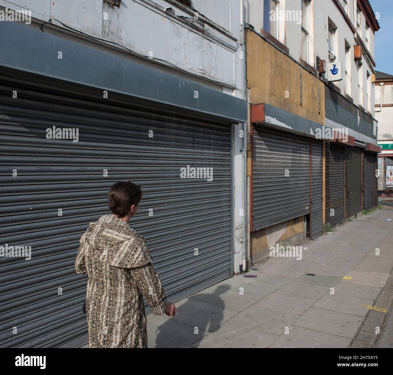 Shuttered shop fronts hi-res stock photography and images - Alamy