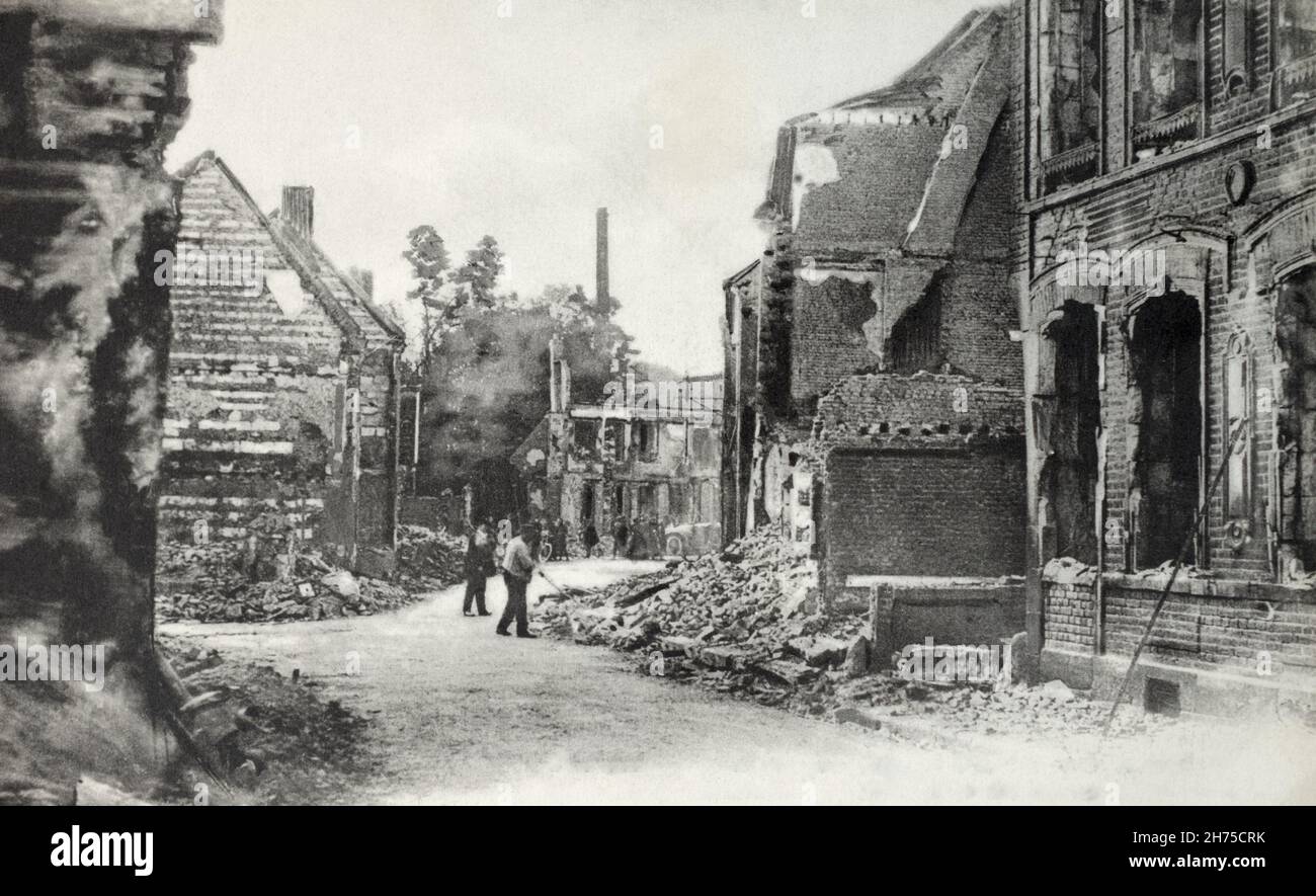 A historical view of damaged houses in Albert, Somme, France, during the First World War. C.1916. Stock Photo