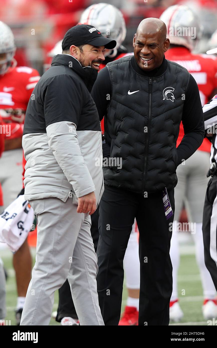 columbus-united-states-20th-nov-2021-michigan-state-spartans-head-coach-mel-tucker-talks-with-ohio-state-buckeyes-head-coach-ryan-day-prior-to-their-game-in-columbus-ohio-on-saturday-november-20-2021-photo-by-aaron-josefczykupi-credit-upialamy-live-news-2H75DH6.jpg