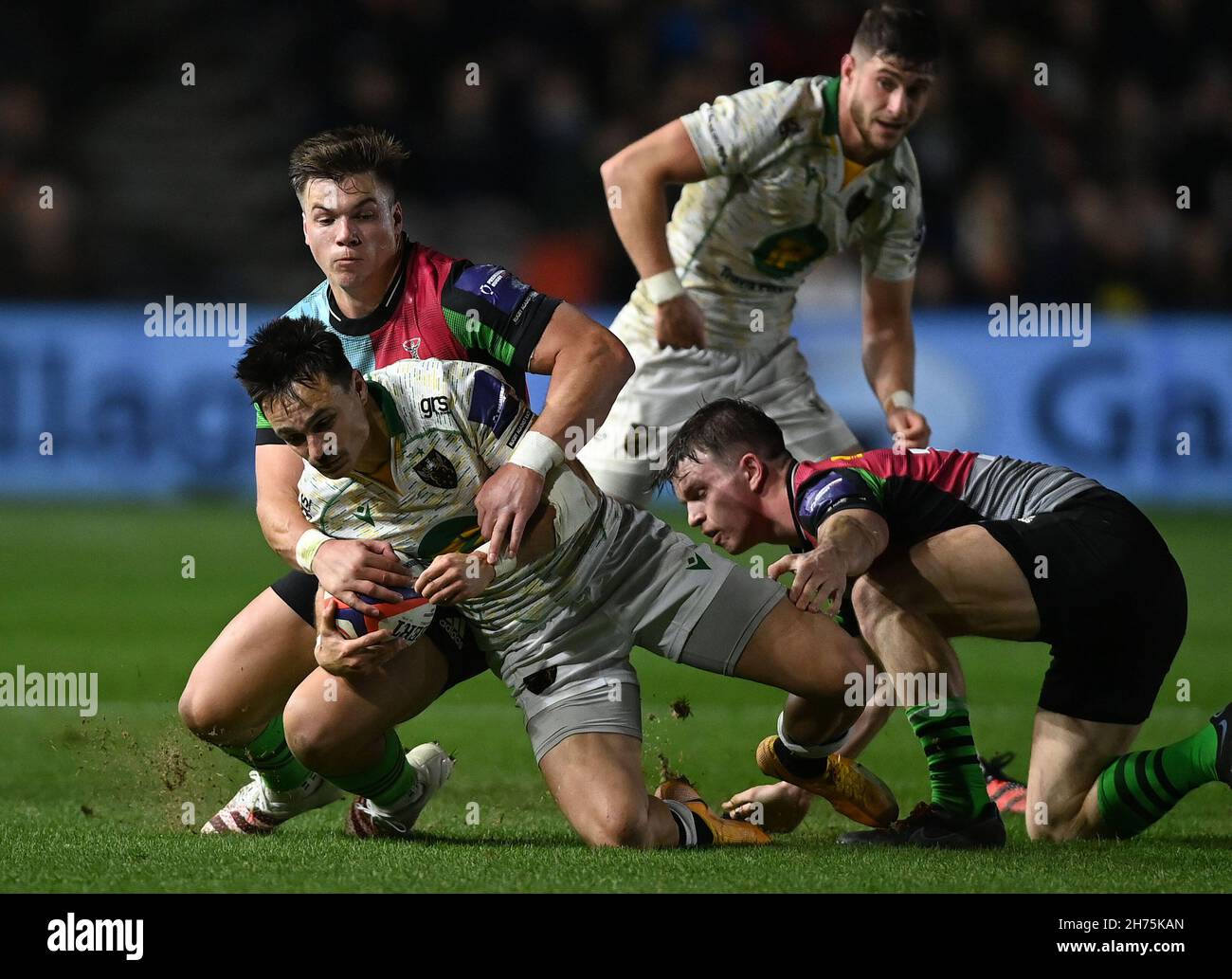 Twickenham, United Kingdom. 19th Nov, 2021. Premiership Rugby. Harlequins V Northampton Saints. The Stoop. Twickenham. Tom Collins (Northampton Saints) is tackled by Huw Jones (Harlequins) during the Premiership Cup game between Harlequins and Northampton Saints at The Stoop, Twickenham. Credit: Sport In Pictures/Alamy Live News Stock Photo