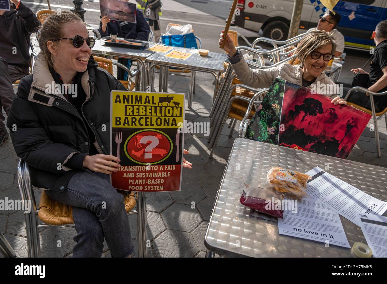 Barcelona, Spain. 20th Nov, 2021. An activist holding a placard expressing her opinion, during the demonstration.Animal Rebellion activists occupied a terrace of a McDonalds establishment in Passeig de Gràcia in Barcelona demanding the transition to a fairer and more sustainable food system. Credit: SOPA Images Limited/Alamy Live News Stock Photo