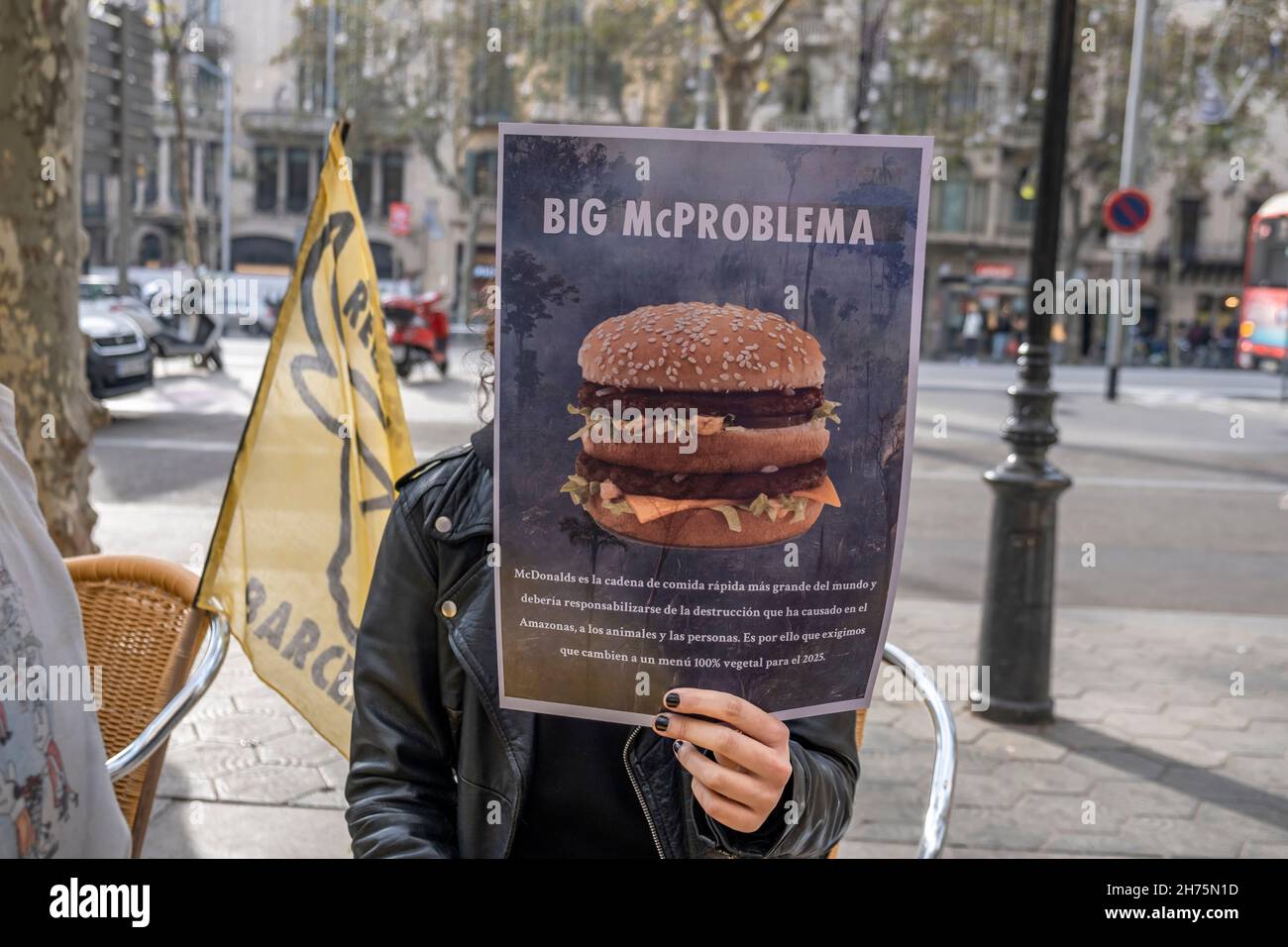 Barcelona, Spain. 20th Nov, 2021. An activist holding a placard expressing her opinion, during the demonstration.Animal Rebellion activists occupied a terrace of a McDonalds establishment in Passeig de Gràcia in Barcelona demanding the transition to a fairer and more sustainable food system. (Photo by Paco Freire/SOPA Images/Sipa USA) Credit: Sipa USA/Alamy Live News Stock Photo