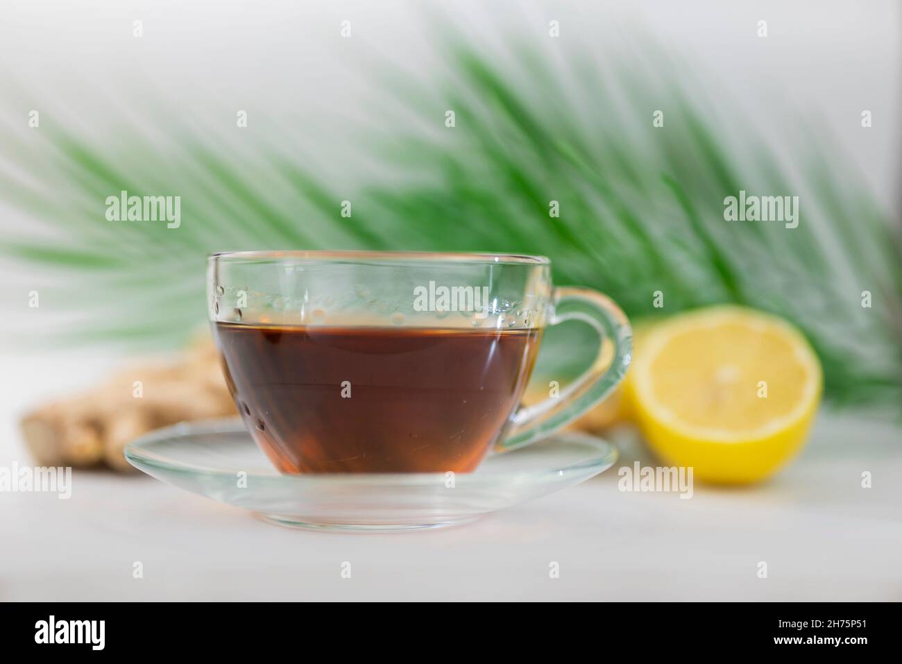 hot black drink tea in a cup with lemon and ginger Stock Photo Alamy