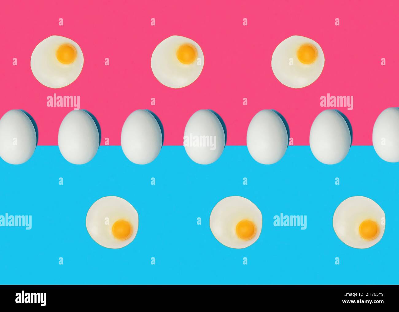 Conceptual raw and boiled eggs pattern Stock Photo