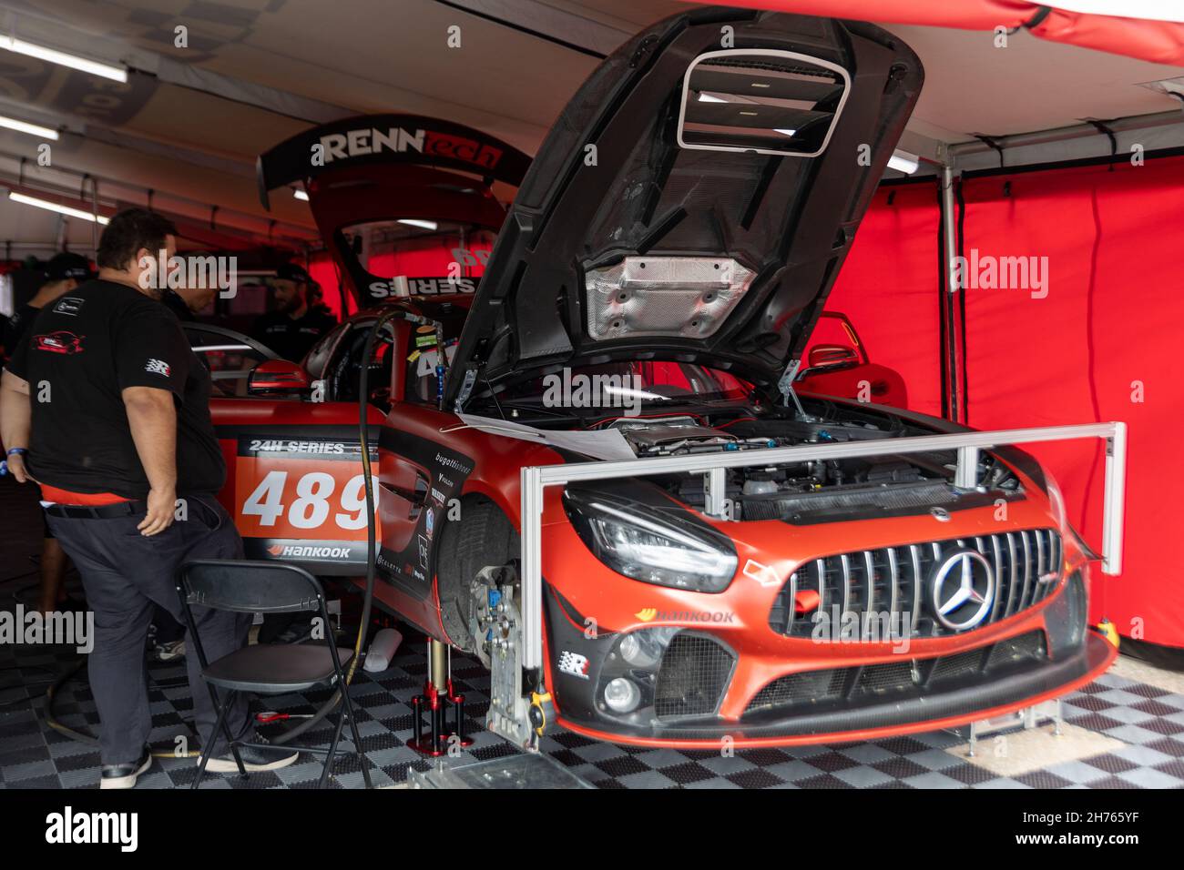 Sebring, USA. 20th Nov, 2021. Preparing cars for start during 24H Series powered by Hankook. Schedule includes USA stops on November 19-21, 2021. Racing cars from the many countries, such as: Germany, USA, France, Nederland, Romania, Denmark, Canada, Spain, Great Britain, Italy; in many different classes: GT4, 991, GTX, GT3, TCR, TCX, P4. (Photo by Yaroslav Sabitov/YES Market Media/Sipa USA) Credit: Sipa USA/Alamy Live News Stock Photo