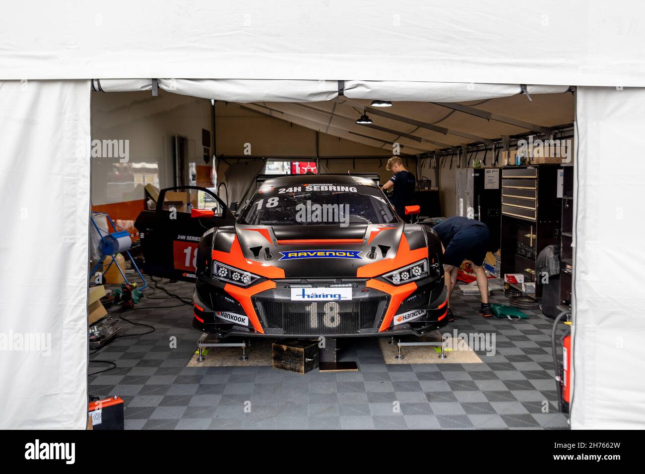 Sebring, USA. 20th Nov, 2021. Preparing cars for start during 24H Series powered by Hankook. Schedule includes USA stops on November 19-21, 2021. Racing cars from the many countries, such as: Germany, USA, France, Nederland, Romania, Denmark, Canada, Spain, Great Britain, Italy; in many different classes: GT4, 991, GTX, GT3, TCR, TCX, P4. (Photo by Yaroslav Sabitov/YES Market Media/Sipa USA) Credit: Sipa USA/Alamy Live News Stock Photo