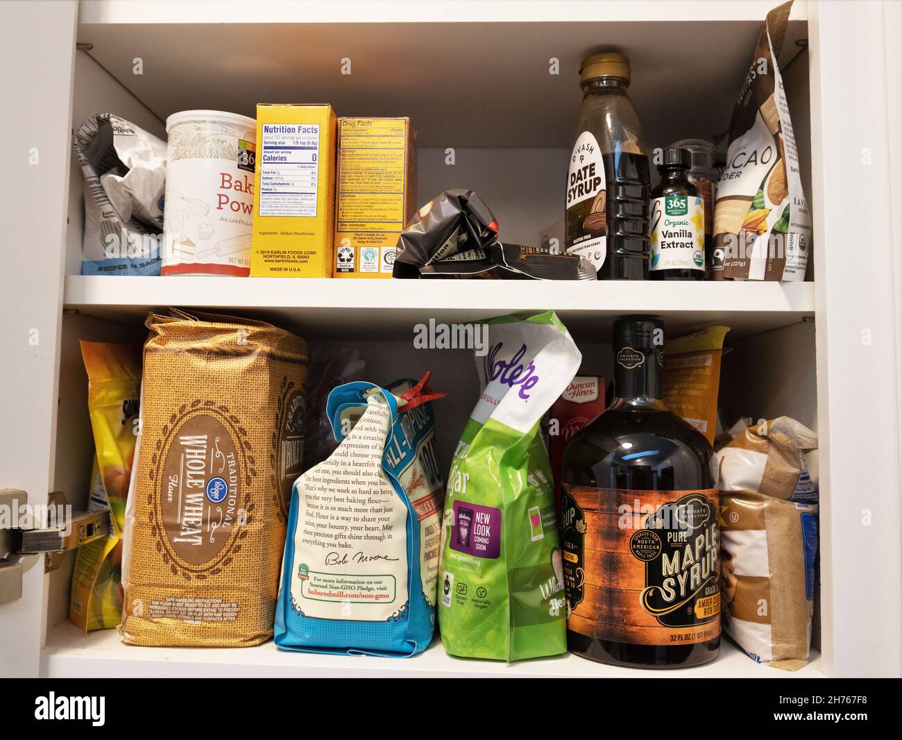 A kitchen stuffed full of baking supplies Stock Photo Alamy