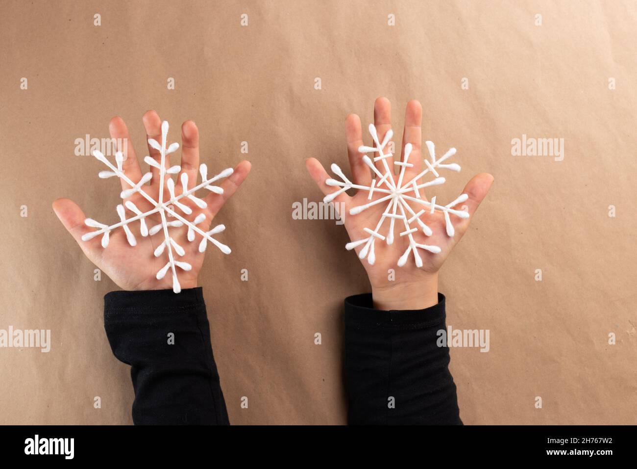 cotton swab snowflake craft for kids, Christmas activity for preschooler, home decoration Stock