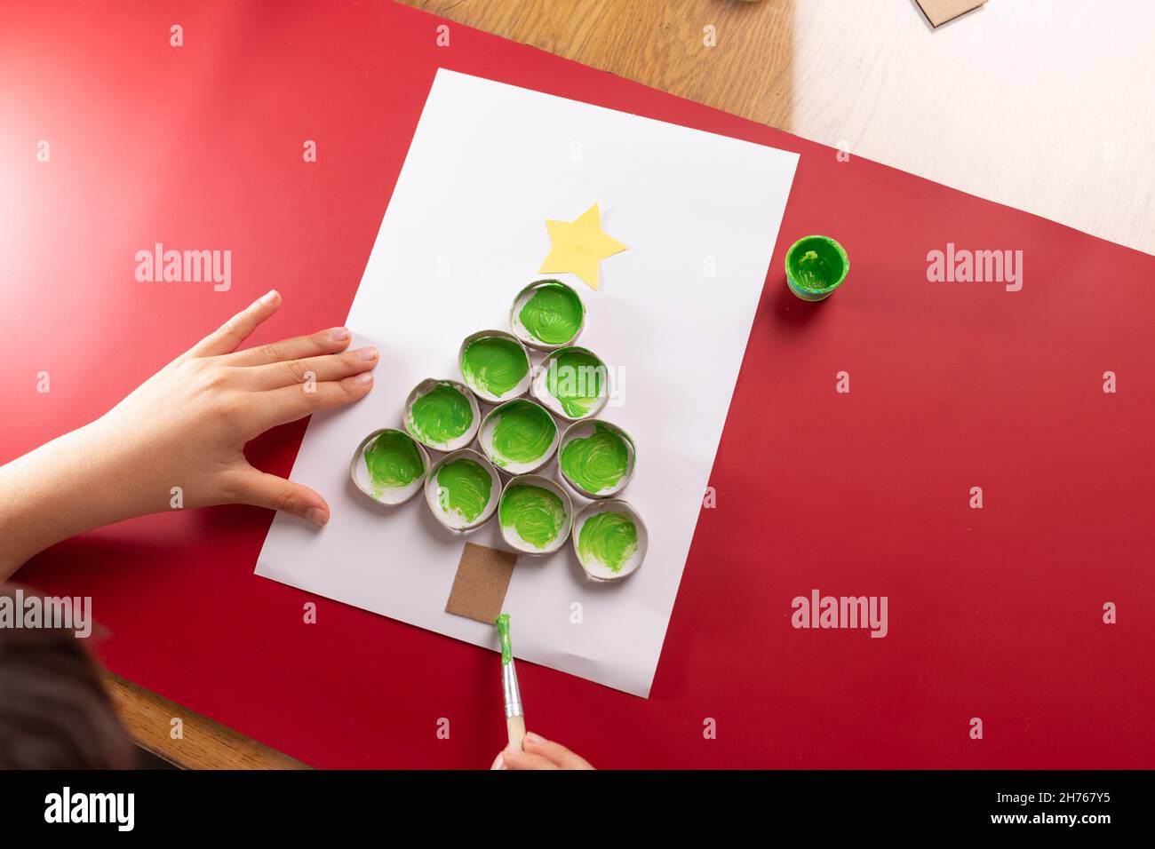toilet paper roll craft for kids, DIY, Christmas tree fingerprint craft  Stock Photo - Alamy