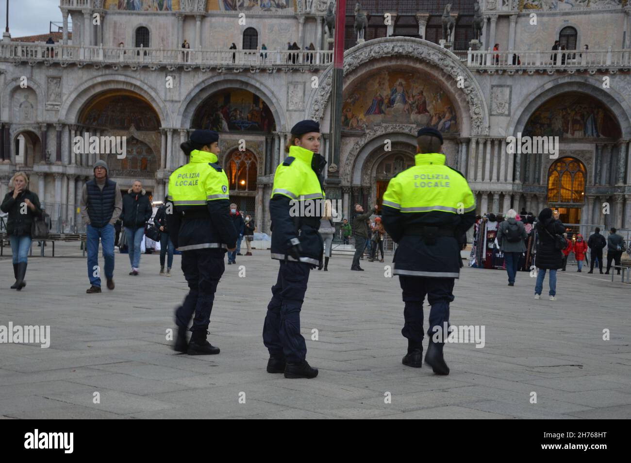 Local police in the late afternoon at Piazza San Marco in Venice, Italy - November 8, 2021. Stock Photo