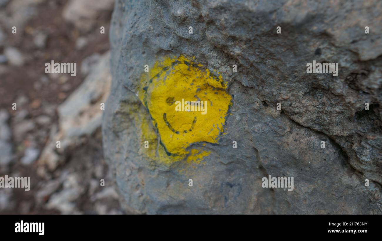 Smiley face on rock hires stock photography and images Alamy