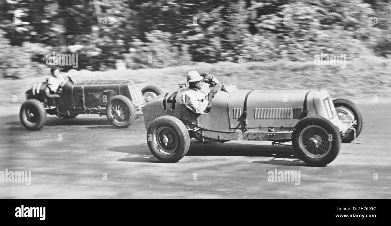 #14 ERA R11B driven by Hon P Aitken, who finished 7th, probably being overtaken by #11 ERA R9B, driven by R E Ansell, who finished 4th, at Donington 10th June 1939.. Photograph taken by T W Green.. Stock Photo