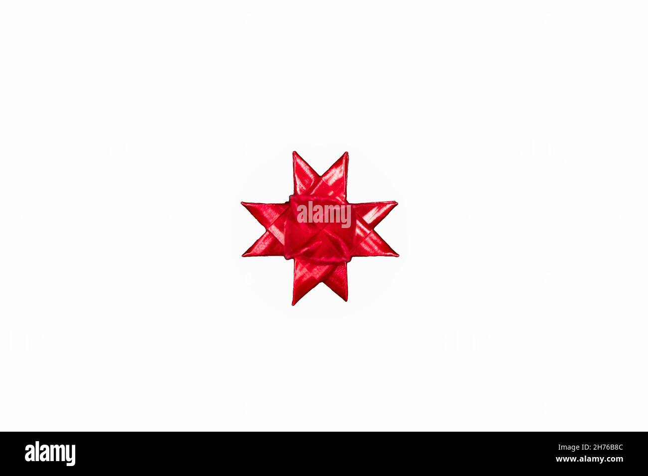 Lonr star Floding paper stars. on red. Stock Photo