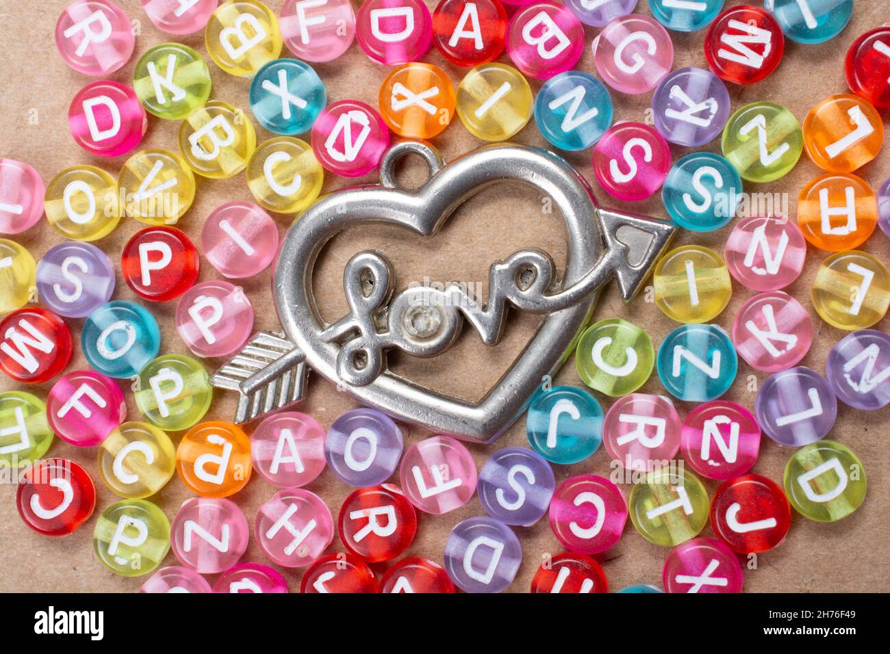 Heart shape and love wording amid colorful alphabet letters Stock Photo ...