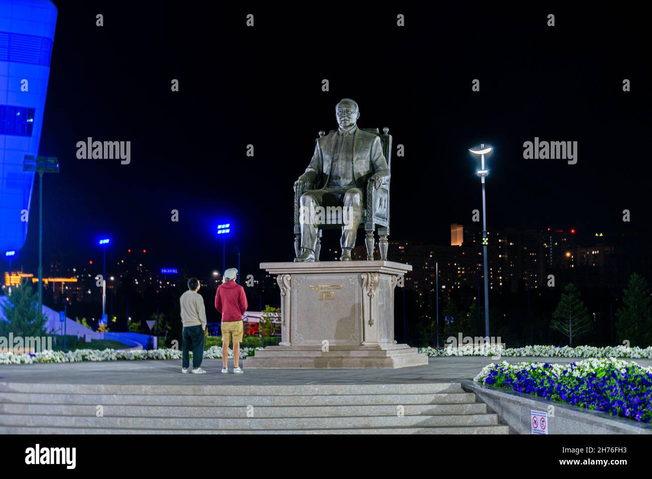 Sculpture of first President of Kazakhstan Nursultan Nazarbaev sitting in the chair, bronze, July 2021. The elbasy, ruler of Kazakhstan. Nur-Sultan Stock Photo