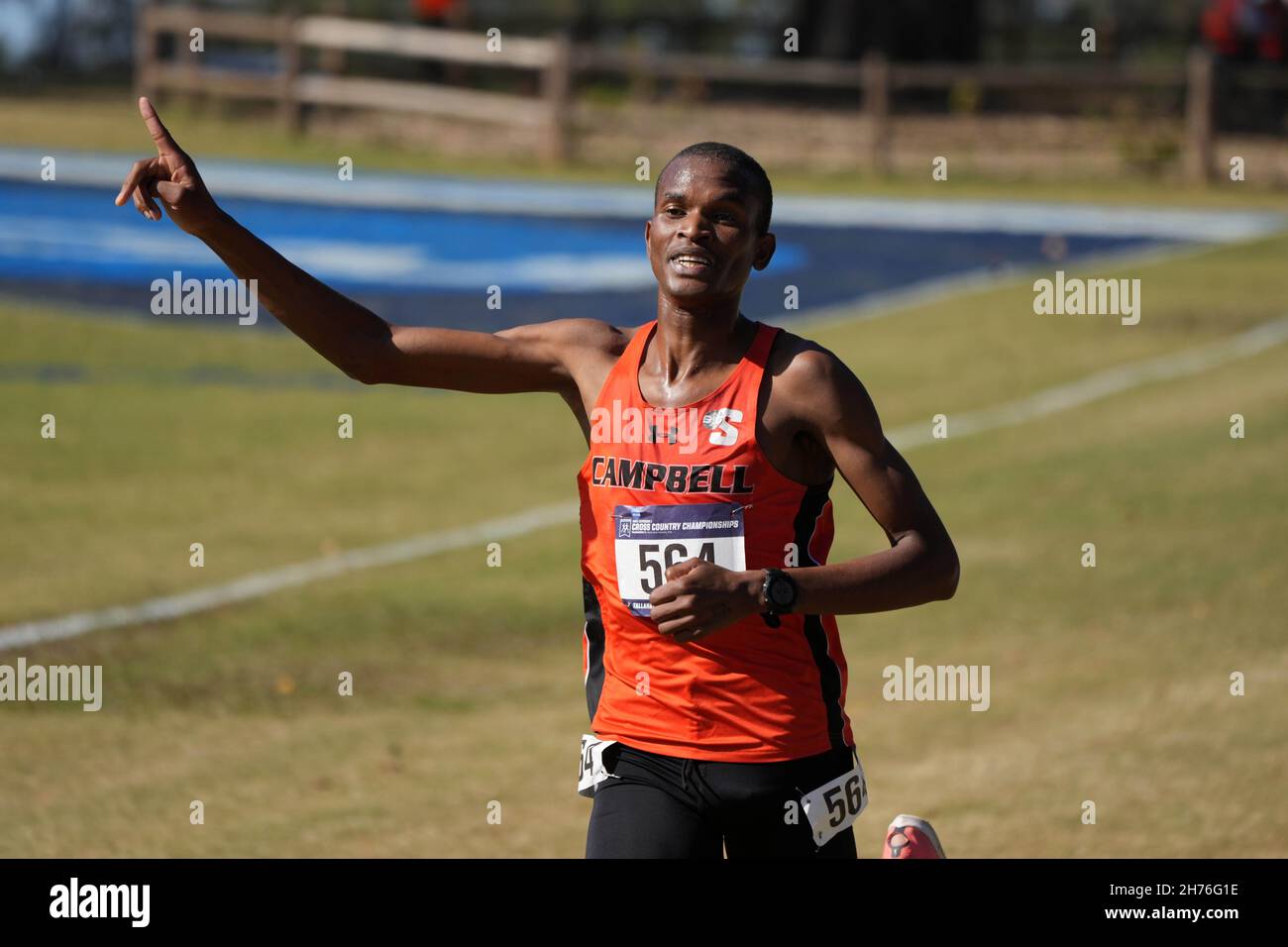 Athanas Kioko of Campbell celebrates after placing third in the men's race in 28:49.9 during the NCAA cross country championships at Apalachee Regiona Stock Photo