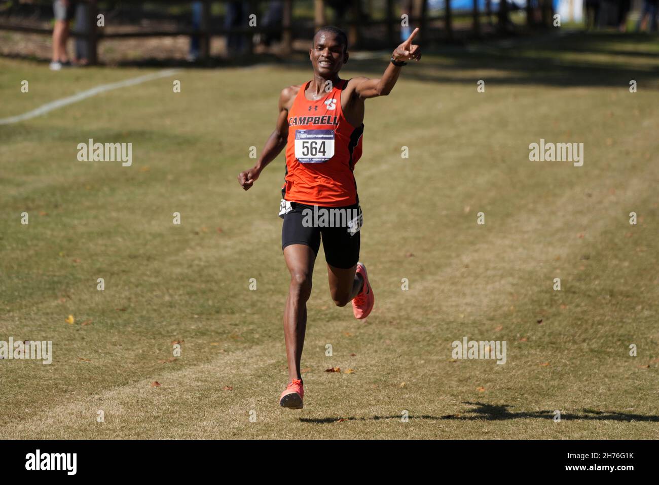 Athanas Kioko of Campbell celebrates after placing third in the men's race in 28:49.9 during the NCAA cross country championships at Apalachee Regiona Stock Photo