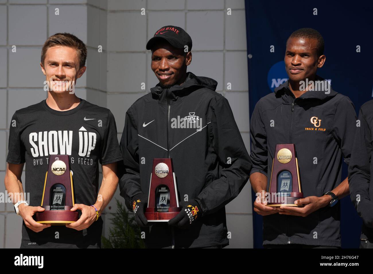 Conner Mantz of BYU (left), Wesley Kiptoo of Iowa State (center) and Athanas Kioko of Campbell pose after placing first, second and third in the men's Stock Photo