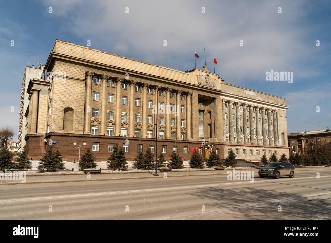 The building of the Krasnoyarsk Territory administration, formerly the House of Soviets, in the process of restoration, on Mira Avenue, in the spring. Stock Photo