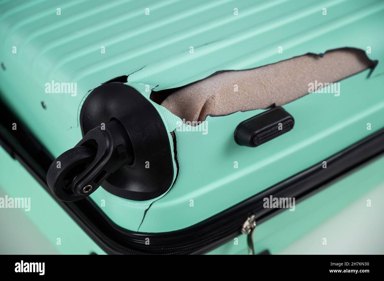 A closeup of a broken plastic suitcase Stock Photo Alamy