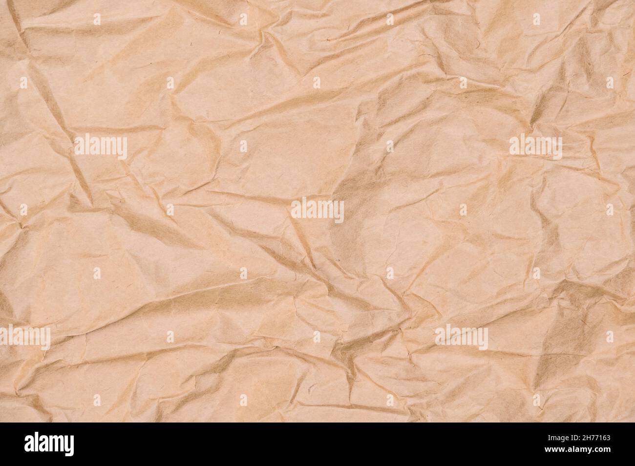 Brown crumpled paper texture background,be crush paper for creased and wrinkled for texture backdrop from shockproof paper Stock Photo