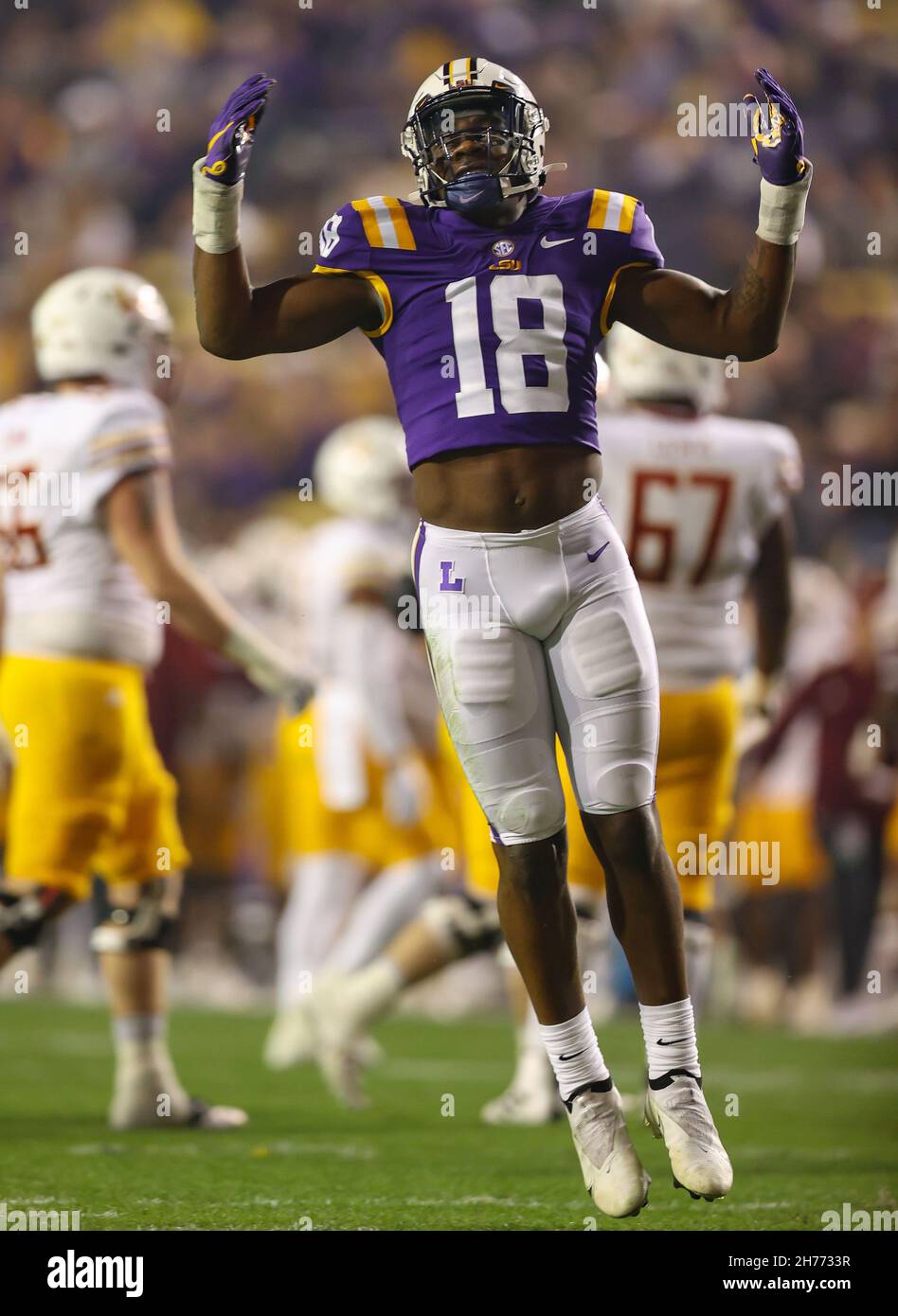 Baton Rouge, LA, USA. 20th Nov, 2021. LSU's Damone Clark #18 encourages the Tiger fans to get loud 'during the NCAA football game between the LSU Tigers and the ULM Warhawks at Tiger Stadium in Baton Rouge, LA. Kyle Okita/CSM/Alamy Live News Stock Photo