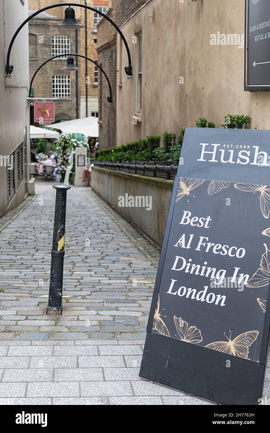 LONDON, UK - JULY 14, 2021:  Sign for Hush alfresco dining in Brook Street, Mayfair Stock Photo
