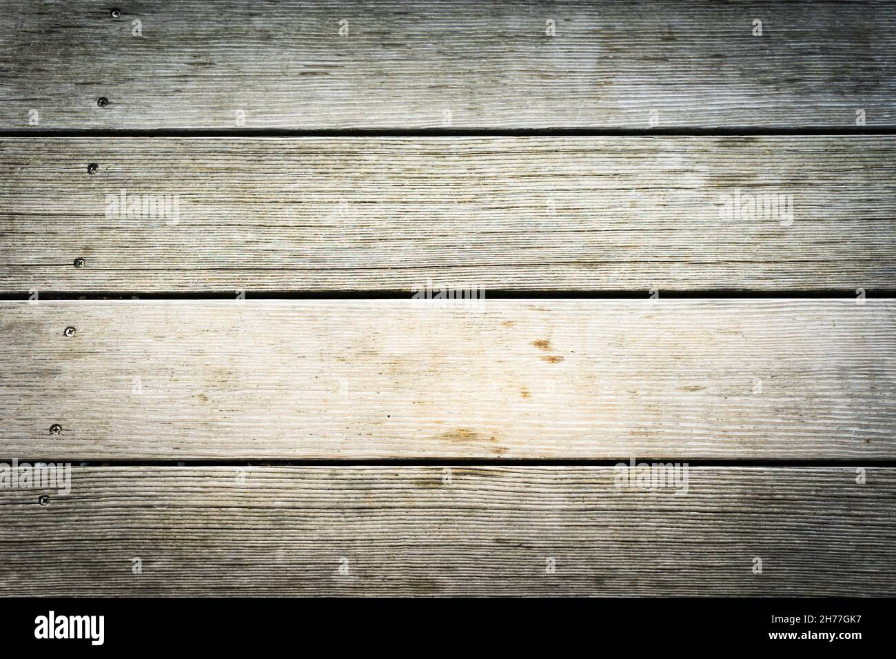 Wooden planks placed horizontally with lots of texture and light tones. Background concept. Stock Photo