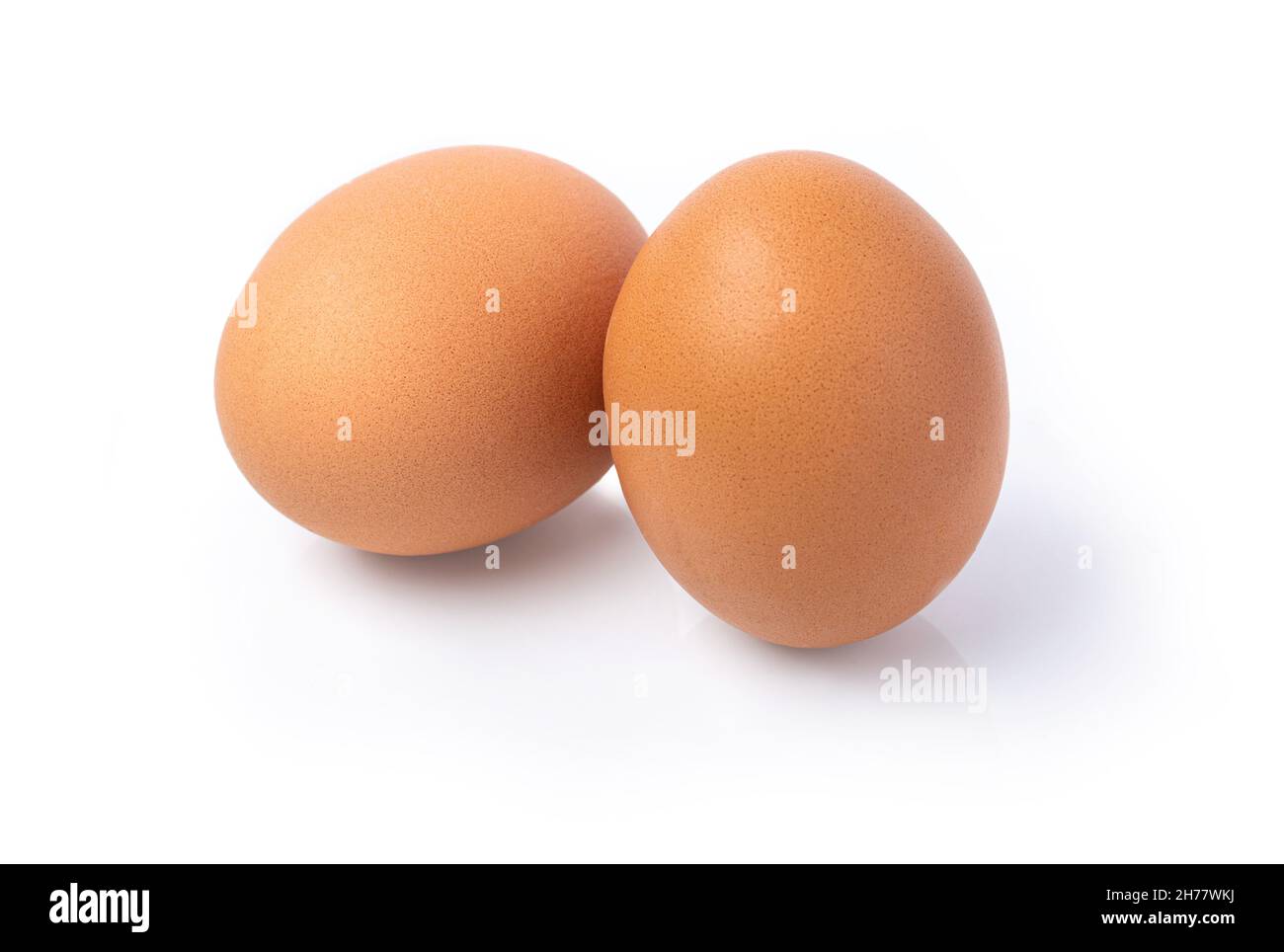 two eggs isolated on white background Stock Photo - Alamy