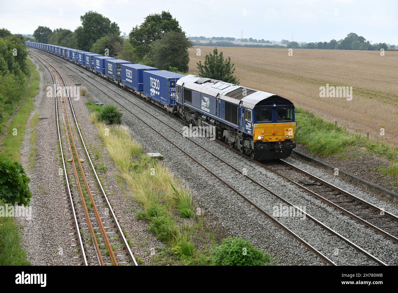 Direct Rail Services Class 66 number 66422 leading a Tesco Container train from Daventry International Freight Terminal to Doncaster iPort Stock Photo