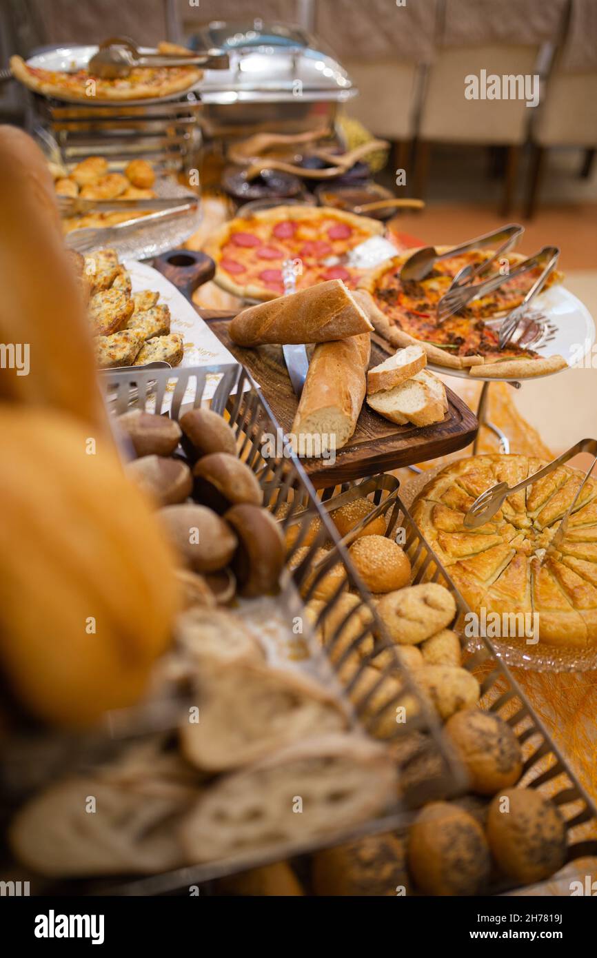 assorted bread basket on the buffet table Stock Photo Alamy