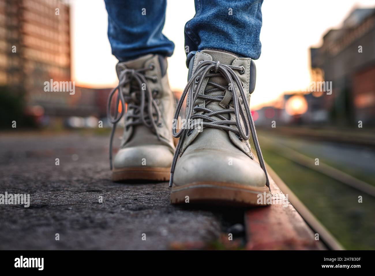 Leather hiking boots. Close up walking ankle boot in city Stock Photo Alamy