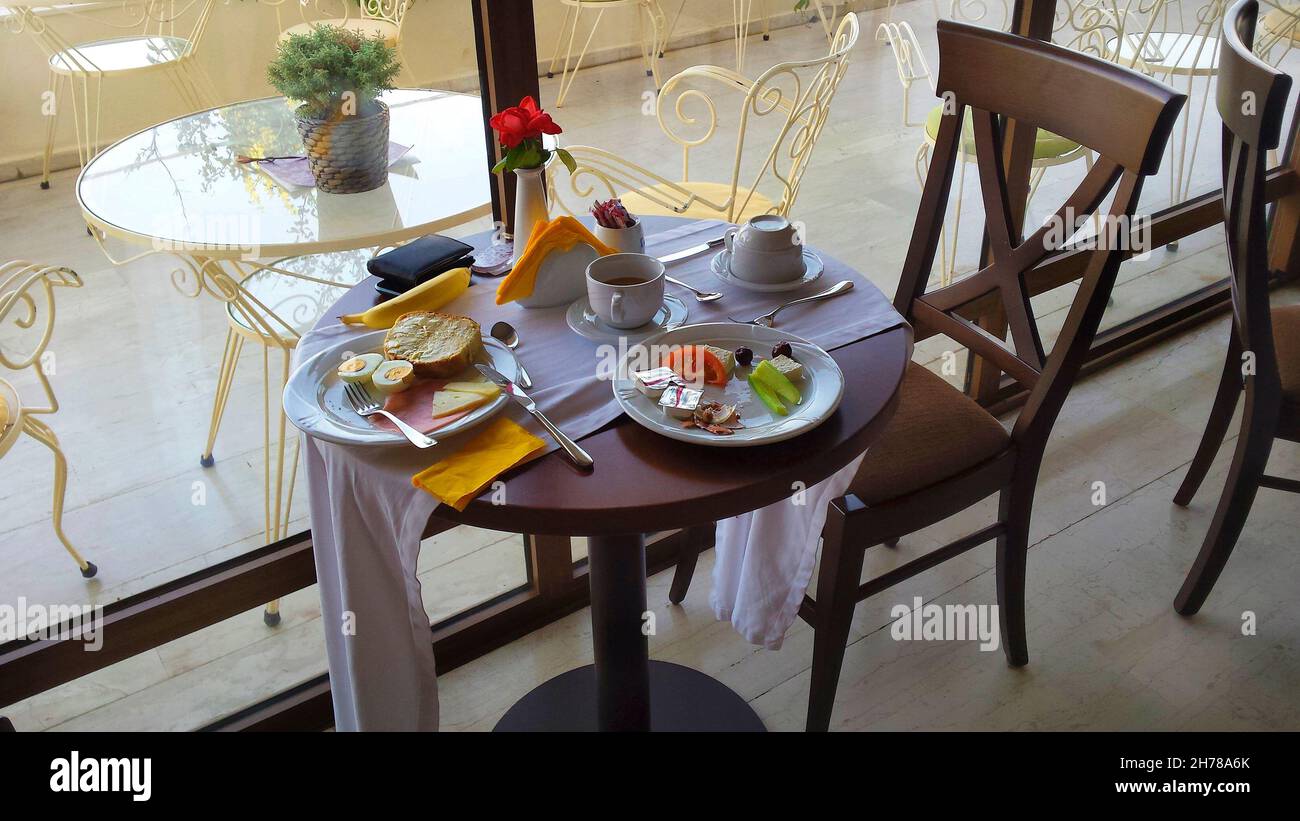 Greece, table with breakfast Stock Photo - Alamy
