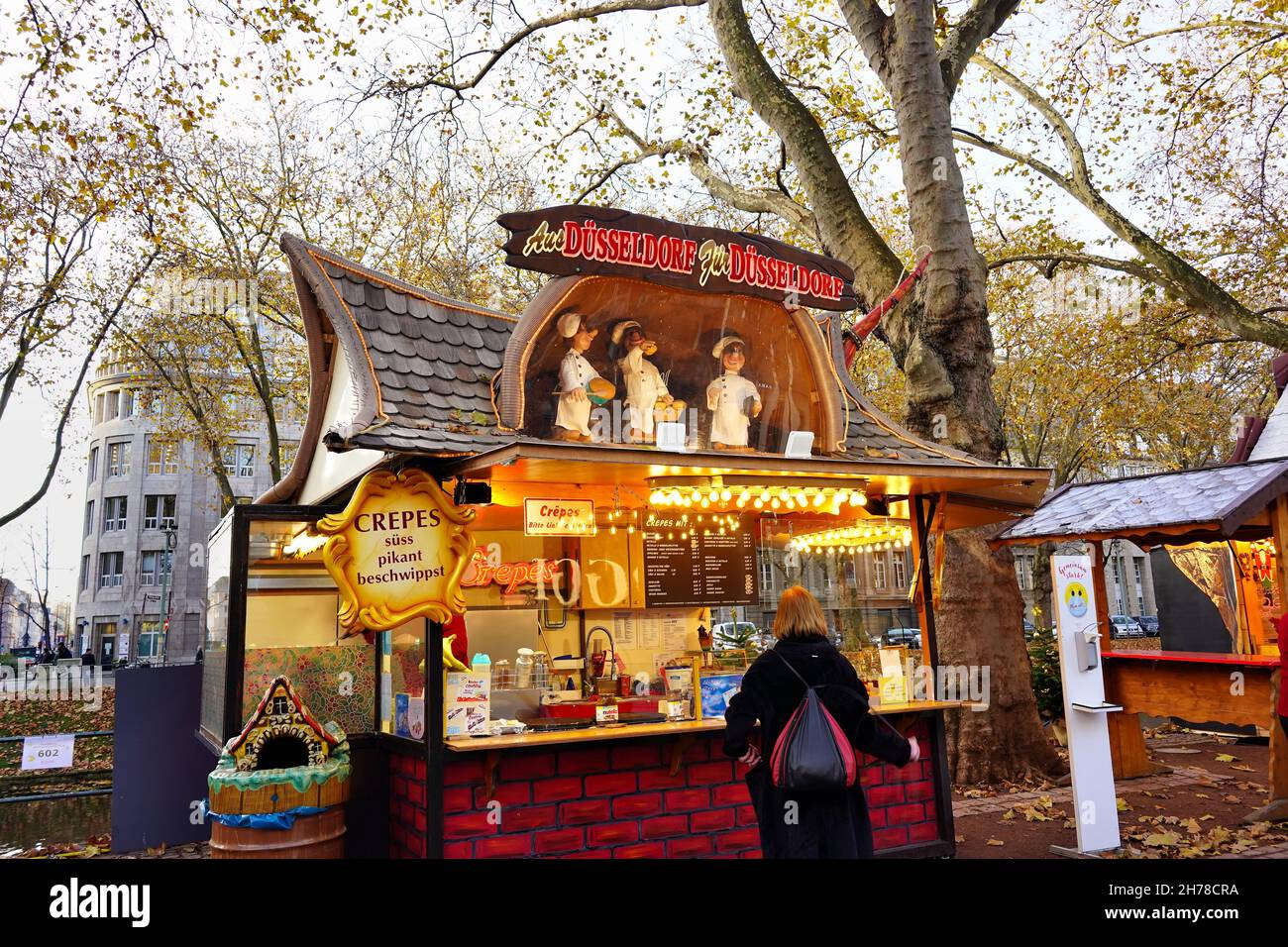 Crepes stand at the Christmas market 2021 on Königsallee in Düsseldorf/Germany. Stock Photo
