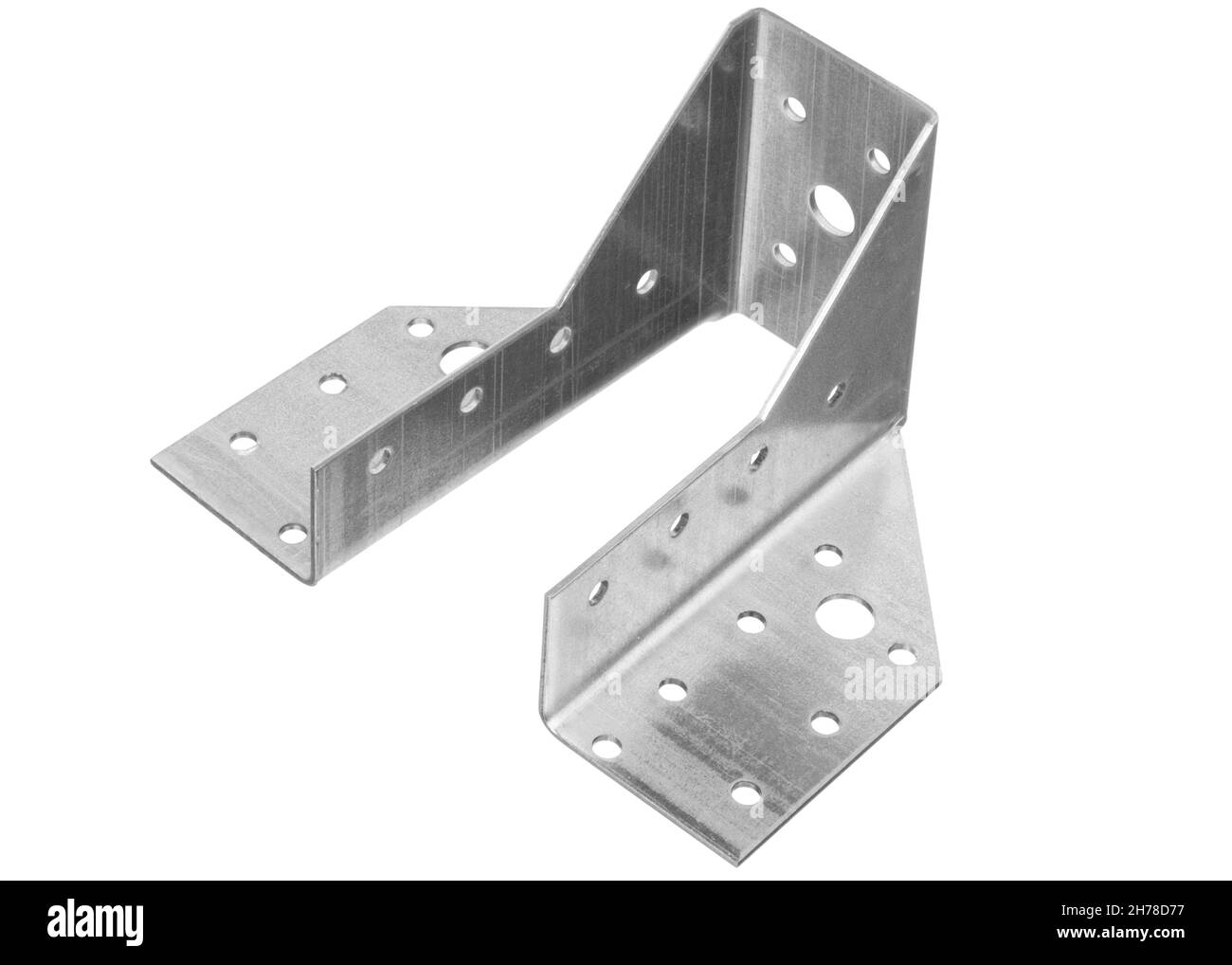 Stainless steel metal fixing angle isolated on white background. The metal corner is used in construction for the installation of various parts. Stock Photo
