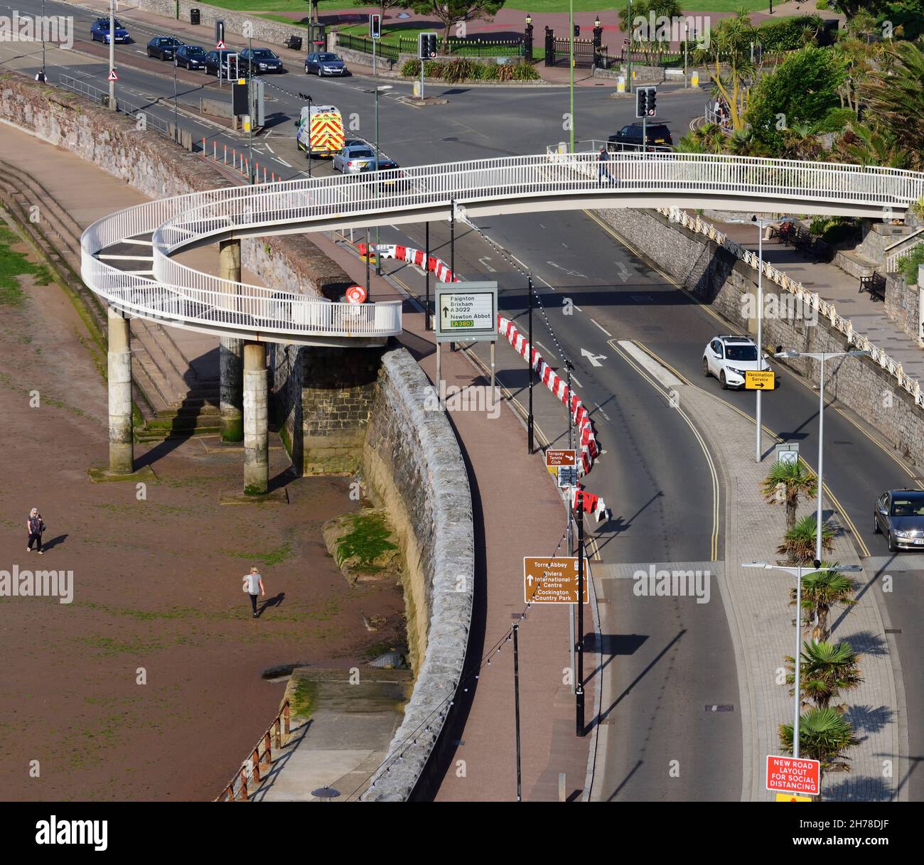 Spiral footbridge across the seafront road at Torquay, South Devon
