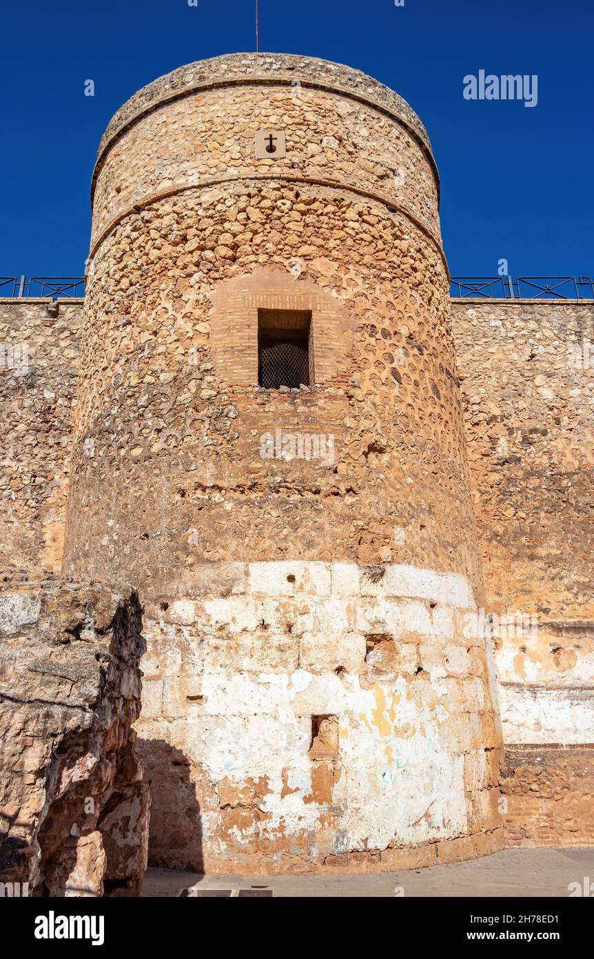 Round tower or turret in  defensive walls of Niebla castle, in Huelva, Andalucia, Spain Stock Photo