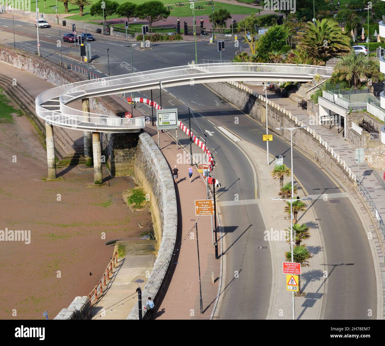 Spiral footbridge across the seafront road at Torquay, South Devon