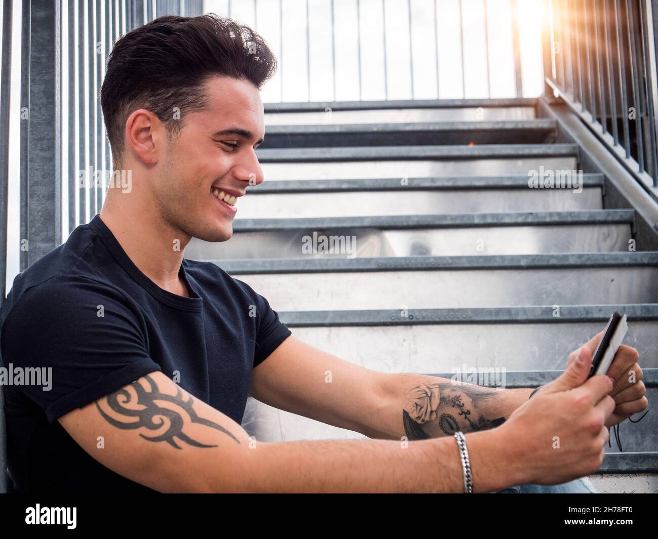 Man sitting on sidewalk curb hi-res stock photography and images - Alamy